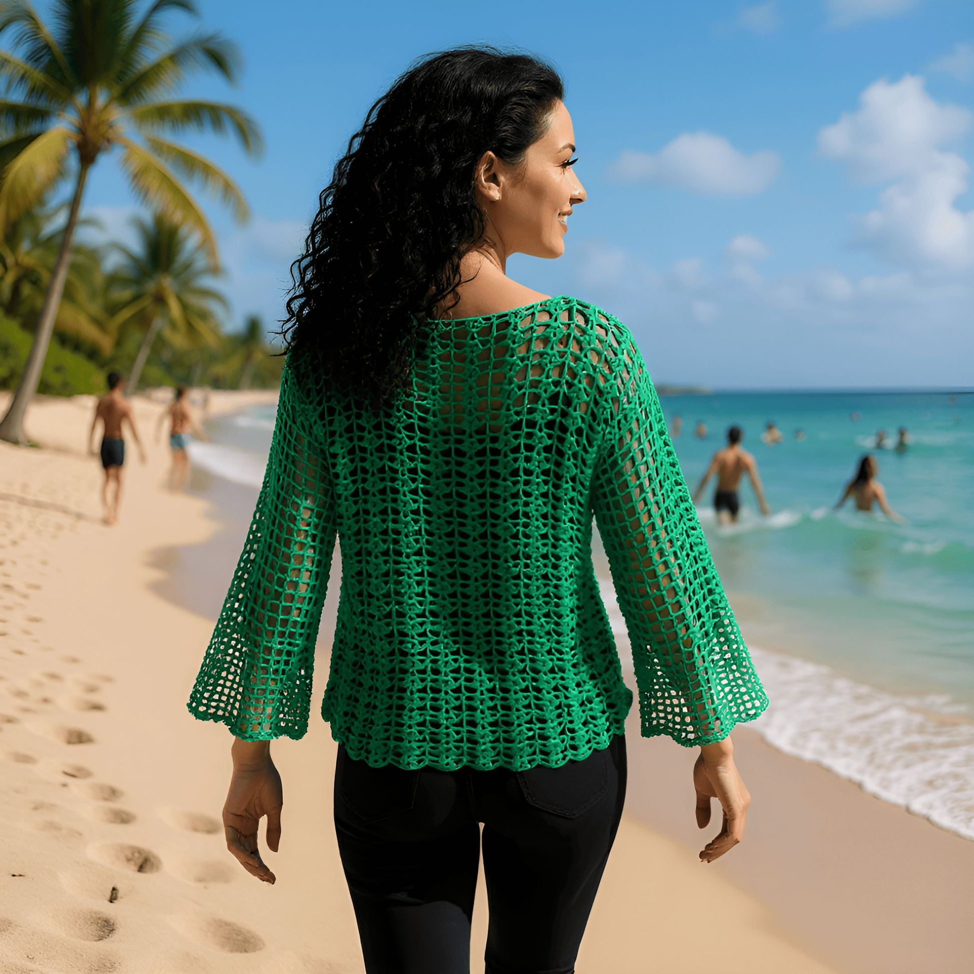 Pull au crochet Marimar de Cachalabibi - vue de dos d'une jeune femme en bord de mer turquoise