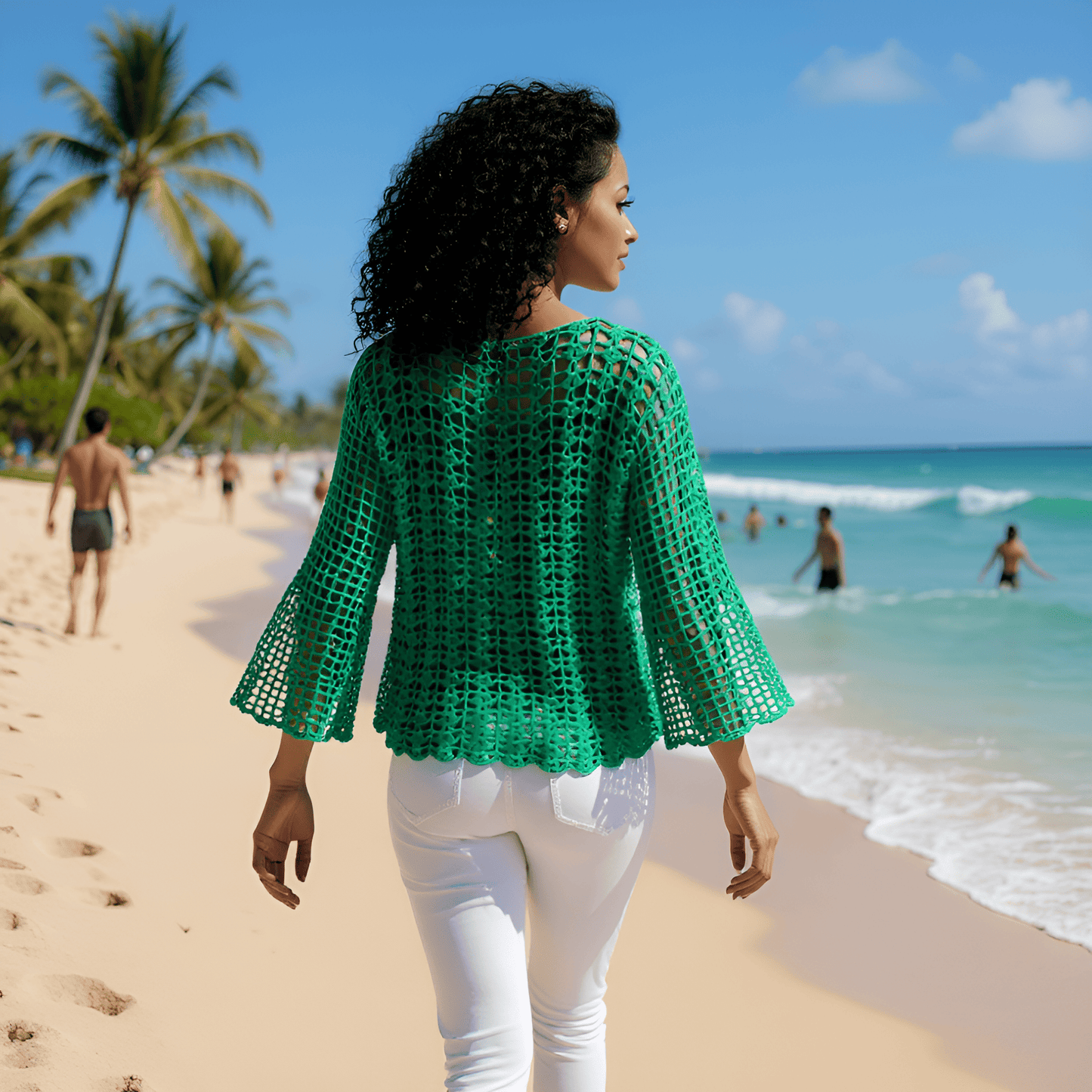Pull au crochet Marimar de Cachalabibi -vue de dos d'une demoiselle qui marche sur le sable 