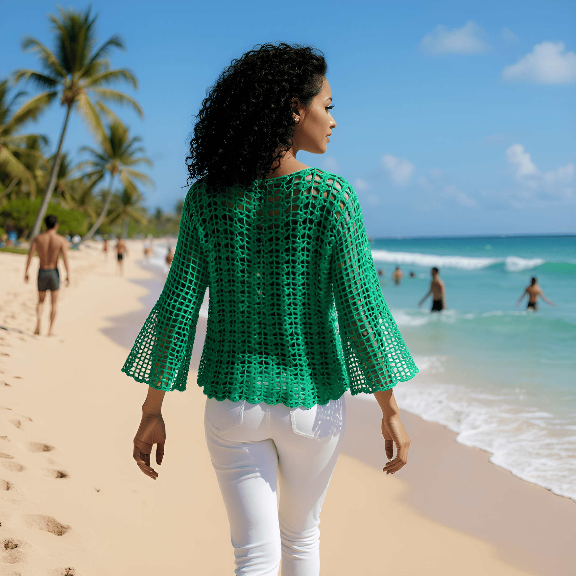 Pull au crochet Marimar de Cachalabibi -vue de dos d'une demoiselle qui marche sur le sable 