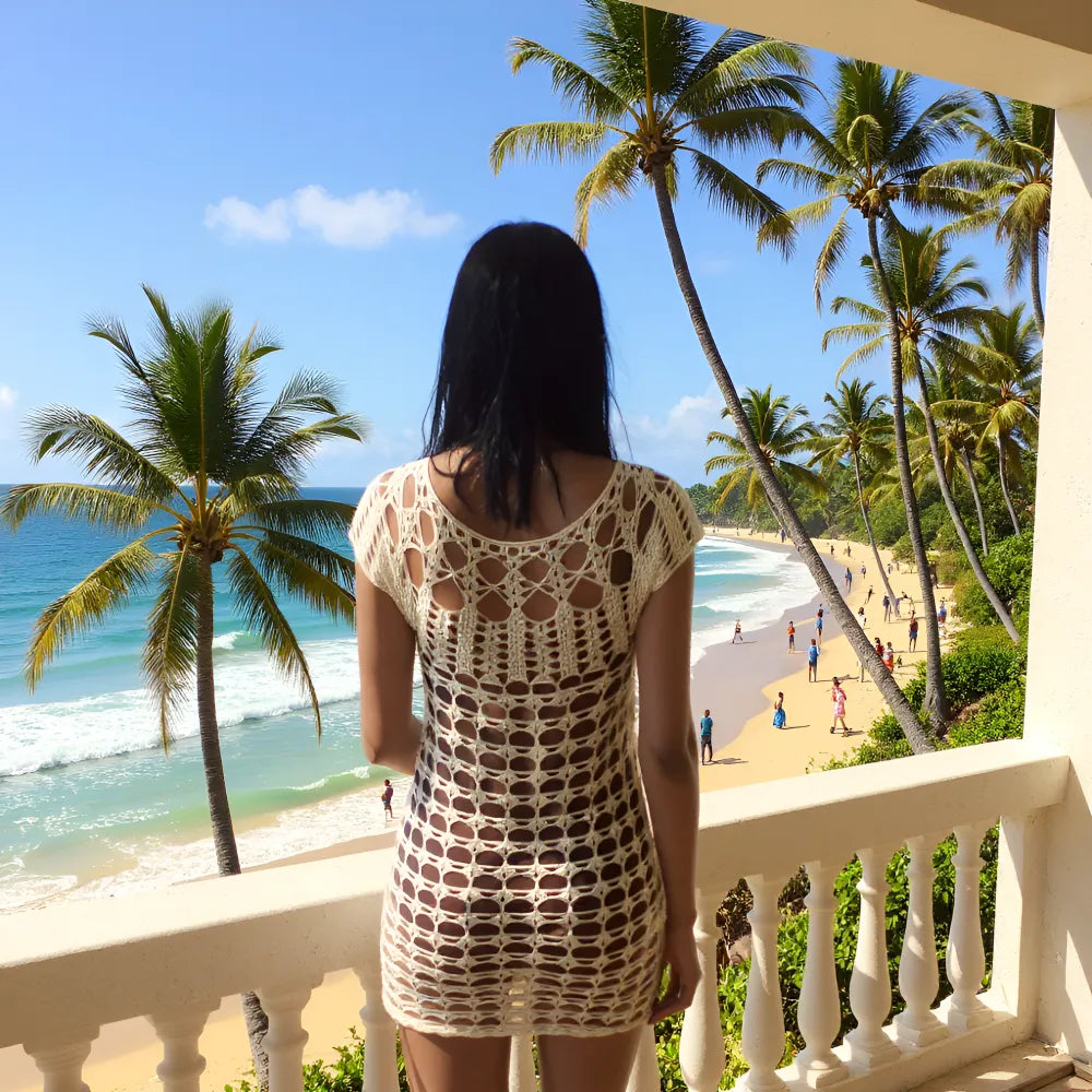 Robe de bain au crochet La playa de Cachalabibi - vue de dos sur balcon face à l'océan turquoise